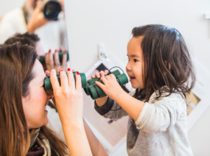 child with binoculars